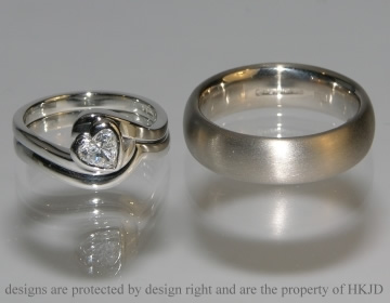 A Pair of commissioned platinum wedding rings