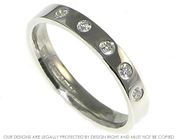 18ct white gold eternity ring with 5 2mm brilliant cut diamonds.