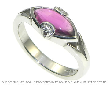 Plum tormaline platinum engagement ring. 