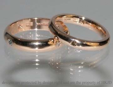 9ct Rose gold eternity rings with heat-treated coloured diamonds