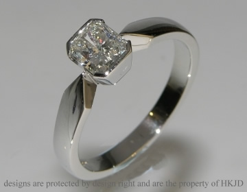 Platinum engagement ring with a rare radiant cut diamond