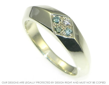 Art deco white gold engagement ring with coloured heat-treated diamonds