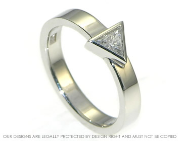 Platinum solitaire with triangular diamond