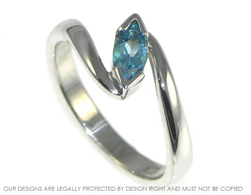 9ct white gold engagement ring with marquise cut topaz. 