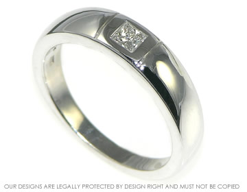 9ct white gold ring with an engraved line either side of the diamond.