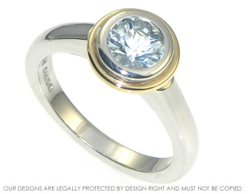 A 9ct white and yellow gold ring with an 0.75ct Aquamarine.  