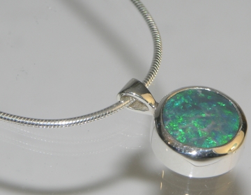 Silver commissioned pendant using customers own opal