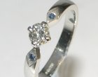 platinum, diamond and sapphire commissioned solitaire engagement ring