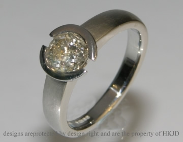 Bespoke platinum engagement ring incorporating cutomers own 1.06cts old cut diamond. 