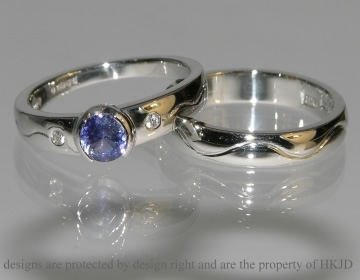 Commissioned platinum wedding band with engraved detail.