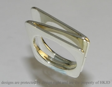 Unusual 9ct white gold concertina ring