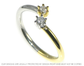 Daisy chain ring with two diamonds in 18ct white and yellow gold