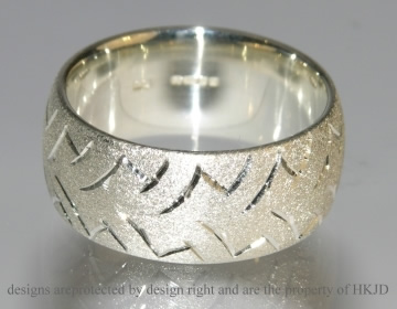 9ct white gold motor bike inspired wedding ring.