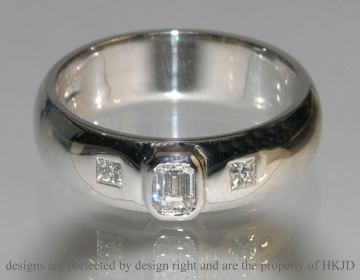 9ct white gold engagement ring with an emerald cut 0.23ct diamond