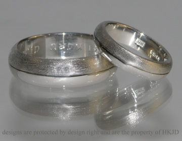 Pair of commissioned platinum wedding rings