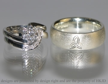 Pair of 9ct white gold commissioned wedding bands