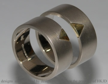 Pair of unique commitment rings in 18ct yellow and white gold