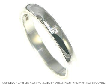 Silver dress ring with a single 1.5mm Brilliant cut diamond