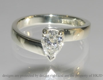 9ct white gold and pear shaped diamond engagement ring. 