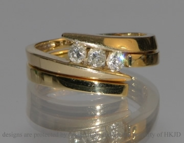 Bespoke 18ct yellow gold asymetrical fitted wedding ring. 