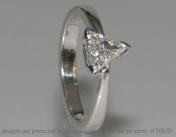 18ct white gold and a trillion cut diamond commissioned diamond engagement ring