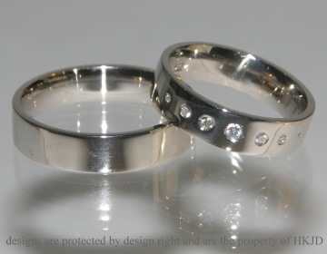 Polished 18ct white gold commissioned wedding rings