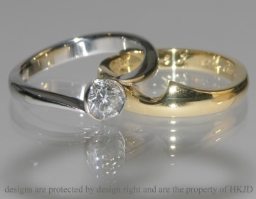 Pair of commissioned fitted wedding rings