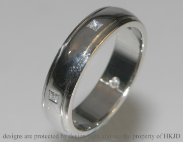 Pair of 18ct white gold commissioned wedding rings