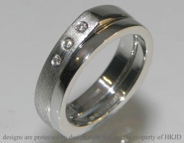 Platinum traingular wedding band. 