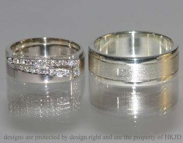 A pair of white gold commissioned wedding bands