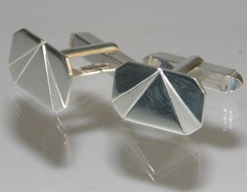 A pair of Sterling silver commissioned cufflinks