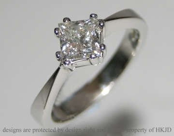 Platinum diamond solitaire inspired by an antique victorian ring