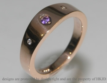 Commissioned 9ct rose gold and amethyst wedding ring