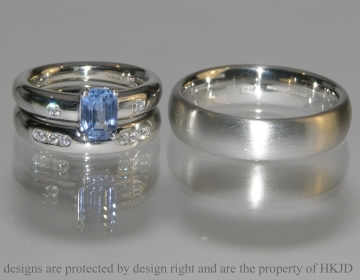 Pair of commissioned platinum and diamond wedding bands 