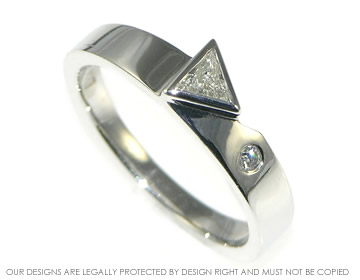 18ct white gold mountain engagement ring with triangle diamond.