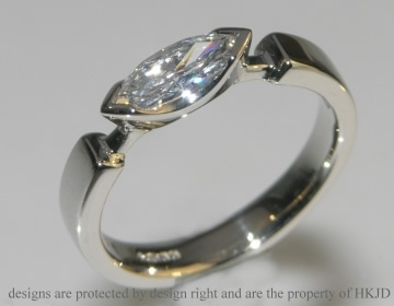 Commissioned platinum and marquise cut diamond engagement ring 