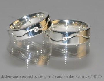 Pair of commissioned Sterling silver commitment rings