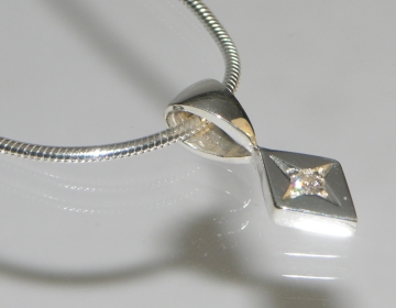 Sterling silver and diamond commissioned pendant