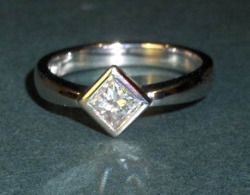 Platinum solitaire commissioned engagement ring