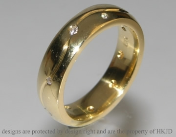 18ct yellow gold and diamond commissioned wedding ring