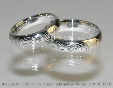 Commissioned engraving on customers own wedding rings