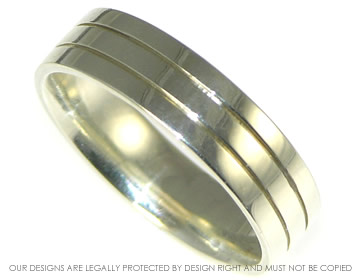 9ct white gold wedding band with engrved detail. 