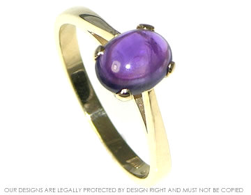 Medieval styled 9ct yellow gold ring with cabochon cut amethyst