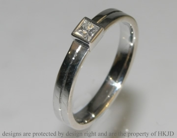 White gold contemporary 0.17cts H SI diamond solitaire