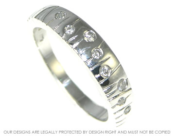 White gold and diamond ring inspired by a meadow of daisies