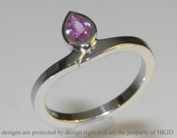 Platinum and pink sapphire tulip inspired engagement ring