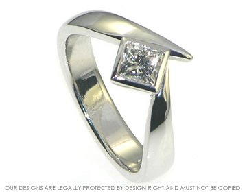 Platinum engagement ring with a 0.52ct princess cut diamond.  