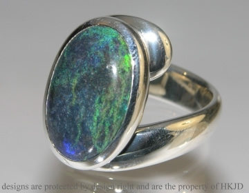 Bespoke silver dress ring with customers own opal matrix