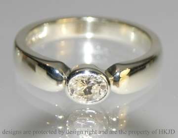 Bespoke 9ct white gold and 0.39cts oval diamond engagement ring 