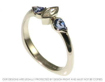 Platinum diamond and sapphire engagement ring.